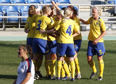 Sweden's players celebrate their goal against the U.S. during their Algarve Women's Soccer Cup final match at Algarve stadium March 11, 2009. 