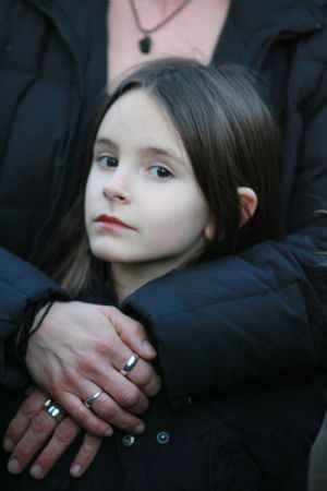 Relatives and friends of the victims wait at the Albertville high school in Winnenden near the southwestern German city of Stuttgart, March 11, 2009. The death toll of Wednesday's school shooting in Winnenden has risen to 16, including the 17-year-old gunman shot dead by the police, officials said. (Xinhua/Luo Huanhuan)