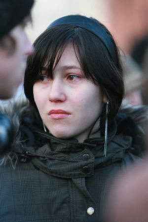 Relatives and friends of victims wait outside the Albertville high school in Wendlingen near the southwestern German city of Stuttgart, March 11, 2009.