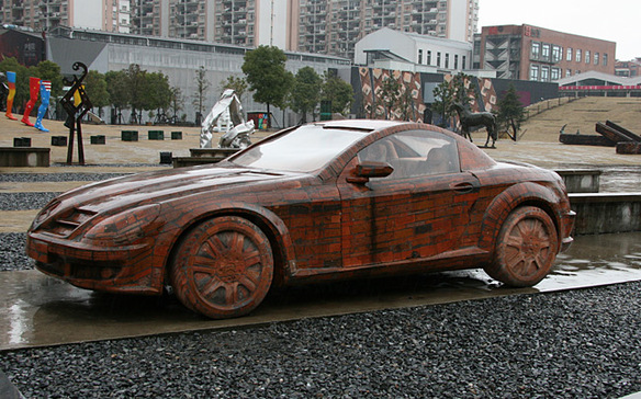 A sulpture showcased inside an abandoned workshop of Red Town, Shanghai. [Photo by Wang Zhiyong/China.org.cn]