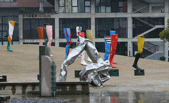 A sulpture showcased inside an abandoned workshop of Red Town, Shanghai. [Photo by Wang Zhiyong/China.org.cn]