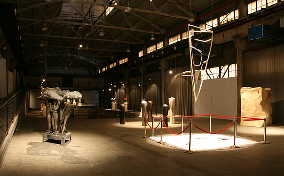 A sulpture showcased inside an abandoned workshop of Red Town, Shanghai. [Photo by Wang Zhiyong/China.org.cn]