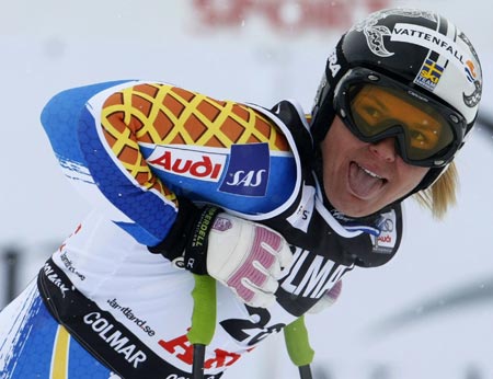 Anja Paerson of Sweden reacts in the finish area after the women's Downhill race at the Alpine Skiing World Cup Finals in Are March 11, 2009.