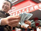 NPC deputies holds different views over consumer coupons