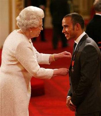 British Formula One driver Lewis Hamilton was awarded a Member of the Order of the British Empire by Queen Elizabeth II on Tuesday. 