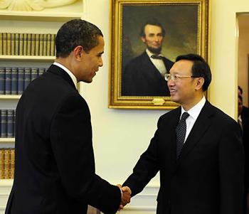 U.S. President Barack Obama (L) meets with Chinese Foreign Minister Yang Jiechi at the White House, Washington, the United States, on March 12, 2009. [Zhang Yan/Xinhua]