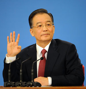 Premier Wen Jiabao answers questions during a press conference after the closing meeting of the Second Session of the 11th National People's Congress (NPC) at the Great Hall of the People in Beijing, March 13, 2009. 