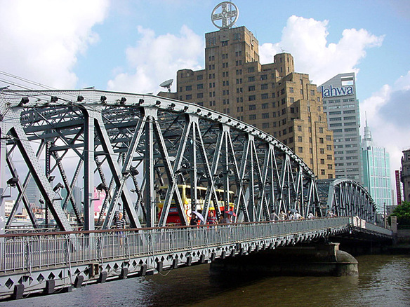 Towering over the Waibaidu Bridge, Shanghai Broadway Mansion has been a prominent luxury hotel since 1930.