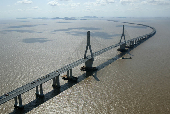 The 32.5-kilometer Donghai Bridge, the first sea-crossing in China, is an important part of the Yangshan Deep Water Port infrastructure, built for Shanghai’s international shipping.