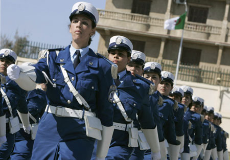 Newly graduated female members of a police special unit march during their graduation ceremony at the police academy in Ain Benian, Algiers, March 15, 2009. [Xinhua/Reuters]