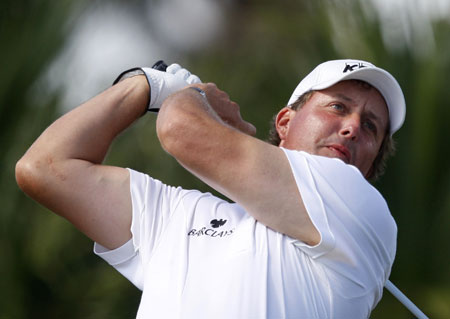 Phil Mickelson of the U.S. hits a shot during final round play of the CA Championship at Doral Golf Resort in Miami, Florida March 15, 2009.