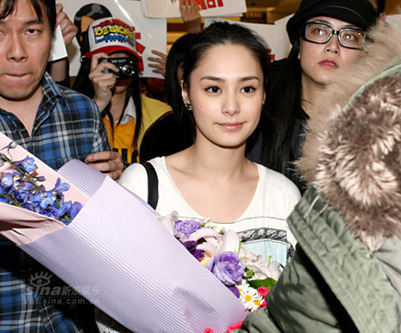 Hong Kong singer Gillian Chung arrives in Taiwan amid screams of adoring fans March 13, 2009. She is in Taiwan to promote a jeans brand and this is her first public appearance in Taiwan after a sex photo scandal she was implicated in first broke out. 