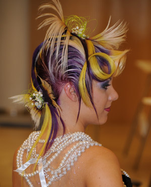 A model displays a hairstyle designed by a competitor during the 2009 Helsinki Hairstyle Competition in Helsinki, capital of Finland, March 14, 2009. The tow-day competition started on March 14. Hairdressers from Finland, Russia and Japan took part in the competition. [Zhao Changchun/Xinhua]