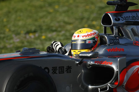 McLaren Formula One driver Lewis Hamilton of Britain drives his car during a training session at the Jerez racetrack in southern Spain March 16, 2009.