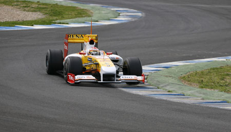 Renault Formula One driver Fernando Alonso of Spain goes through a curve while driving his car during a training session at the Jerez racetrack in southern Spain March 15, 2009. The F1 season will begin March 29 in Australia.