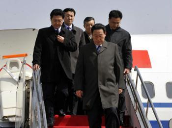 Visiting Premier of the Democratic People's Republic of Korea (DPRK) Kim Yong Il (FRONT) arrives in Jinan, capital of east China's Shandong Province, March 17, 2009. Kim kicked off his official goodwill visit to China Tuesday. [Zhu Zheng/Xinhua] 