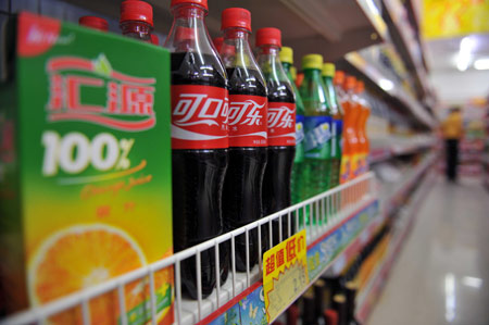 The Ministry of Commerce (MOC) announced on March 18 that Coca-Cola's bid to acquire China Huiyuan Juice Group failed to meet the country's anti-monopoly law. Coca-Cola Company and Huiyuan Juice Group said that they respect the decision of the Ministry of Commerce (MOC) to reject Coca-Cola's 2.3 billion U.S. dollar bid for China's largest juice maker.[Xinhua]