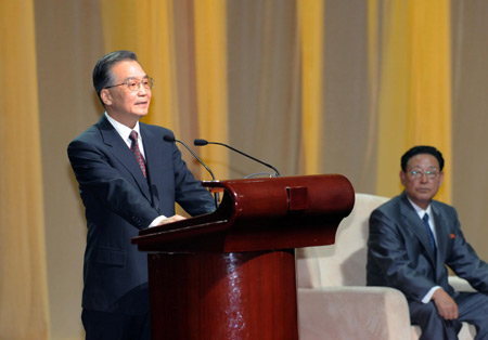 Chinese Premier Wen Jiabao (L) delivers a speech as his counterpart of the Democratic People's Republic of Korea (DPRK) Kim Yong Il listens during a ceremony marking the 60th anniversary of the establishment of the China-DPRK diplomatic relations and the launch of the China-DPRK Friendship Year in Beijing, capital of China, March 18, 2009. [Ma Zhancheng/Xinhua]