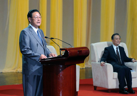 Premier of the Democratic People's Republic of Korea (DPRK) Kim Yong Il (L) delivers a speech as Chinese Premier Wen Jiabao listens during a ceremony marking the 60th anniversary of the establishment of the China-DPRK diplomatic relations and the launch of the China-DPRK Friendship Year in Beijing, capital of China, March 18, 2009. [Ma Zhancheng/Xinhua]