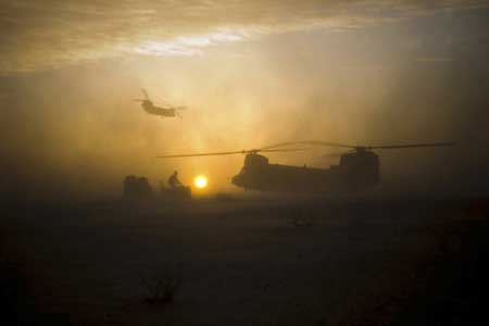  A handout photograph from the Royal marines shows members of 42 Commando during Operation Aabi Toorah (Blue Sword) in Helmand province in southern Afghanistan in an image released March 19, 2009. [Xinhua/Reuters]