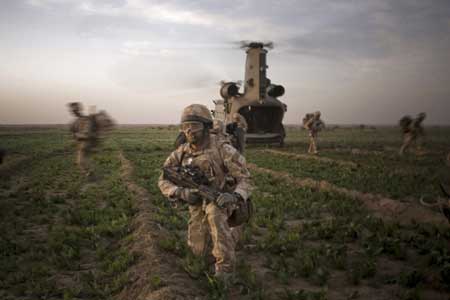 A handout photograph from the Royal marines shows members of 42 Commando during Operation Aabi Toorah (Blue Sword) in Helmand province in southern Afghanistan in an image released March 19, 2009. [Xinhua/Reuters]