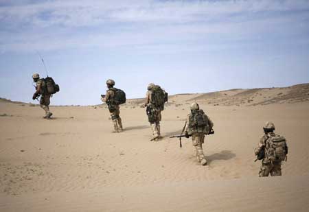 A handout photograph from the Royal marines shows members of 42 Commando during Operation Aabi Toorah (Blue Sword) in Helmand province in southern Afghanistan in an image released March 19, 2009. [Xinhua/Reuters]