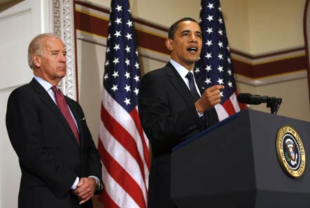 U.S. President Barack Obama (R) delivers remarks to representatives of the National Conference of State Legislatures next to Vice President Joe Biden in Washington March 20, 2009.[Xinhua/Reuters]