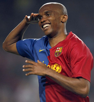 Barcelona's Samuel Eto'o celebrates a goal against Malaga during their Spanish first division soccer league match at Nou Camp Stadium in Barcelona, March 22, 2009.(Xinhua/Reuters photo) 