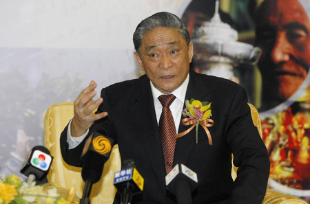 Former vice-chairman of the Standing Committee of the National People's Congress, China's top legislature, Raidi speaks at a joint interview after attending the opening ceremony of the Exhibition of Essence of Tibetan Intangible Cultural Heritage in Macao, south China, March 20, 2009. He emphasized that the fundamental issue of Tibet is economical development and living standard improvment relies on science, education and cultural development and also human resources training. [Xinhua photo]
