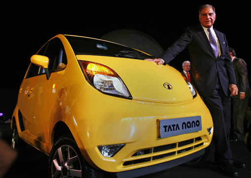 Tata Nano car is seen during the vehicle's launch in Mumbai on March 23, 2009. Tata Motors took the wraps off the world's cheapest car, showcasing the Nano that bosses hope will transform travel for millions of Indians at a glitzy, open-air launch. The basic model -- bookings for which open next month -- sells for just 100,000 rupees (2,000 USD). [Xinhua/AFP]