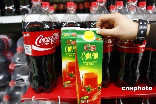 Huiyuan fruit juice is still up for sale in a Carrefour chain-supermarket in Beijing on March 18, 2009 despite the collapse of the Coca-Cola bid.
