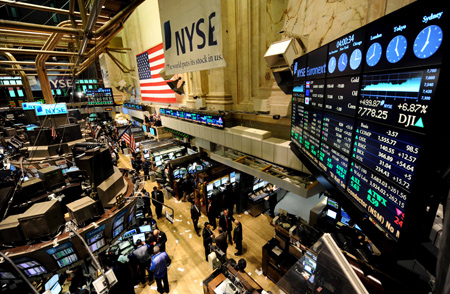 The Dow Jones Industrial Average is seen on a digital display at the New York Stock Exchange March 23, 2009. [Xinhua]