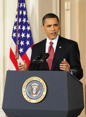 U.S. President Barack Obama speaks during a prime time news conference in the East Room of the White House in Washington, March 24, 2009.