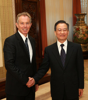 Chinese Premier Wen Jiabao (R) meets with Britain's Former Prime Minister Tony Blair in Beijing, capital of China, March 24, 2009. (Xinhua/Pang Xinglei)