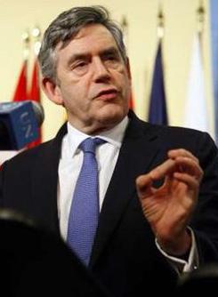 Britain&apos;s Prime Minister Gordon Brown gestures as he speaks during a news conference with U.N. [Chip East/CCTV/REUTERS]