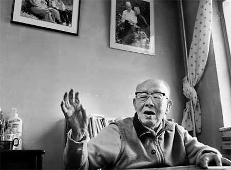 Zhou Youguang's hearing may be poor, but he has never stopped writing.