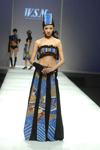 Models present knitwear creations at the WSM Designing Contest held during the China Fashion Week in Beijing on March 26, 2009.