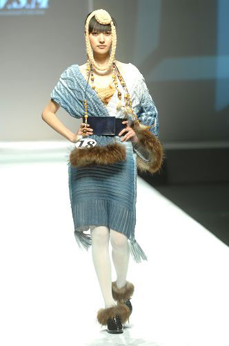 Models present knitwear creations at the WSM Designing Contest held during the China Fashion Week in Beijing on March 26, 2009. 