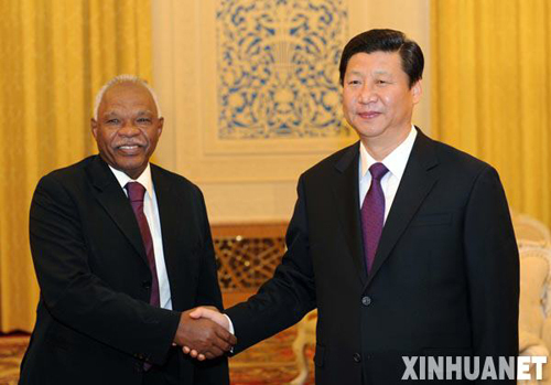 Chinese Vice President Xi Jinping meets with Awad Al-Jaz, special envoy of the Sudanese President Omar al-Bashir, in Beijing on March 27, 2009.