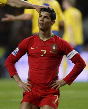 Portugal's Cristiano Ronaldo reacts during their 2010 World Cup qualifying soccer match against Sweden at Dragon stadium in Porto March 28, 2009.