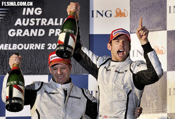 Britain's Jenson Button (R)celebrates with his teammate Brazilian Rubens Barrichello after they finished one-two at the season opening Formula One Australian Grand Prix in Melbourne on Sunday.