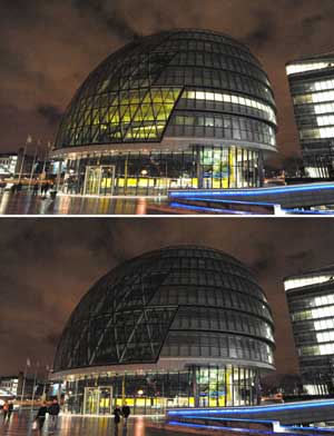 This combo photo taken on March 28, 2009 shows the Greater London Authority (GLA) building after its lights are turned off (bottom) and lit up again, in London. 