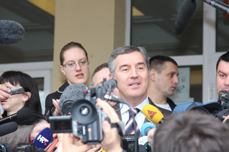 Montenegrin Prime Minister Milo Djukanovic speaks to the media after he casts his vote at Montenegro's parliamentary elections in Podgorica March 29, 2009. 