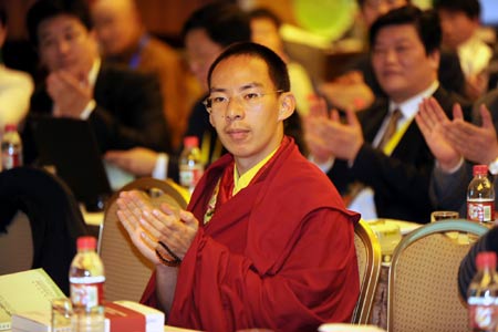 The 11th Panchen Lama, Bainqen Erdini Qoigyijabu, attends a sub-forum of the Second World Buddhist Forum (WBF) in Wuxi, east China's Jiangsu Province, on March 29, 2009.