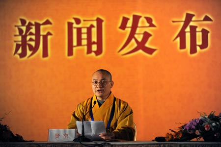 Xiankong of the Famen Temple attends a press conference on a pagoda being built in the Famen Temple, in Wuxi, east China's Jiangsu Province, on March 29, 2009. 