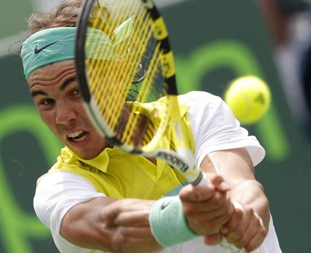 Rafael Nadal of Spain returns a shot to Frederico Gil of Portugal during their match at the Sony Ericsson Open tennis tournament in Key Biscayne, Florida March 30, 2009.