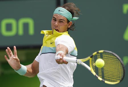 Rafael Nadal of Spain returns a shot to Frederico Gil of Portugal during their match at the Sony Ericsson Open tennis tournament in Key Biscayne, Florida March 30, 2009.