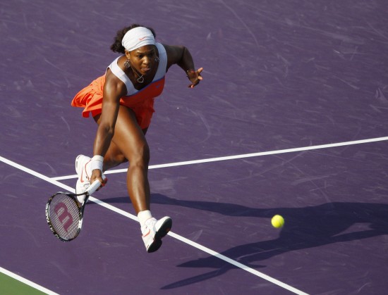 World number one Serena Williams struggled to a 7-5 5-7 6-3 win over China's Zheng Jie yesterday to earn a place in the quarter-finals of the Sony Ericsson Open. [Xinhua]