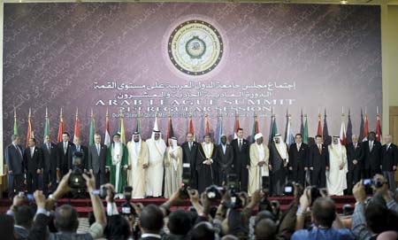 Arab League leaders pose for a group photo prior to the open session of the Arab summit in Doha, capital of Qatar, on Monday, March 30, 2009. The 21 Arab League Summit opened in Doha Monday.(Xinhua/Zhang Ning)