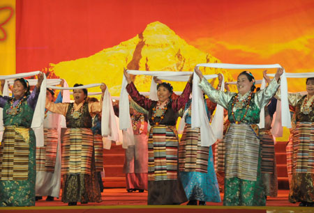 Actresses perform during a concert to commemorate the 50th Anniversary of Democratic Reforms in Tibet, in Lhasa, southwest China's Tibet Autonomous Region, March 31, 2009. (Xinhua/Hu Xing)